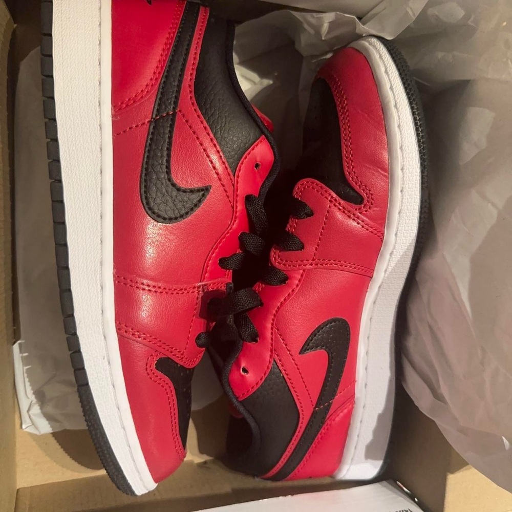 Red air Jordan low 1s